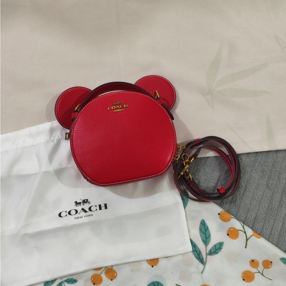 Coach Handbags - Coach Red Ear Round Crossbody Bag